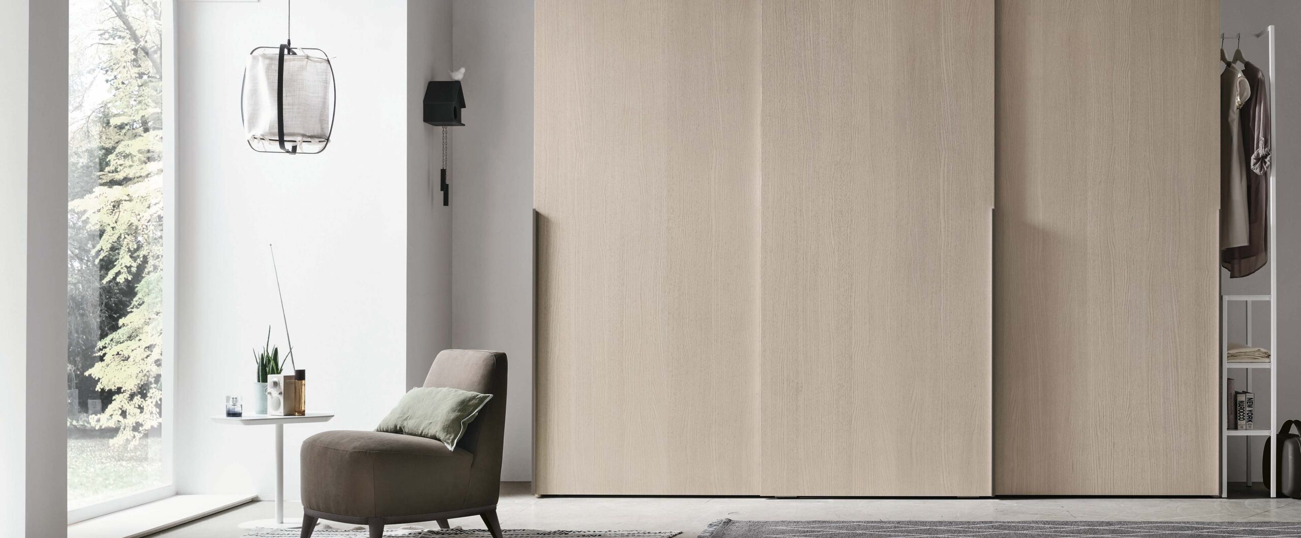 “Liscia Sliding wardrobe by Tomasella – modern Italian wardrobe with smooth handleless sliding doors and minimalist design”