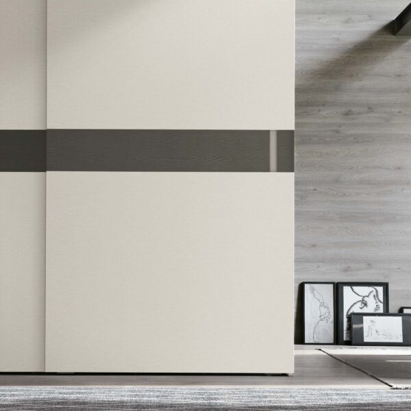 “Athena wardrobe by Tomasella – modern Italian wardrobe with textured vertical groove panels and integrated handles”
