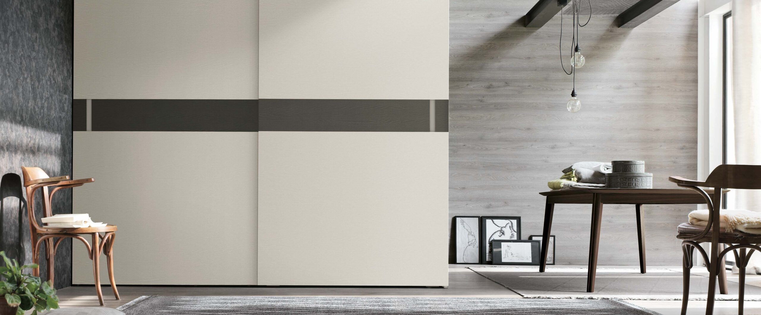 “Athena wardrobe by Tomasella – modern Italian wardrobe with textured vertical groove panels and integrated handles”