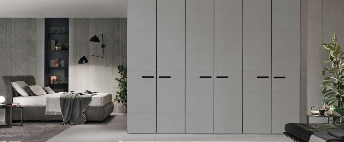 “Dress wardrobe by Tomasella – modern Italian wardrobe with smooth handleless doors and sleek minimalist design”