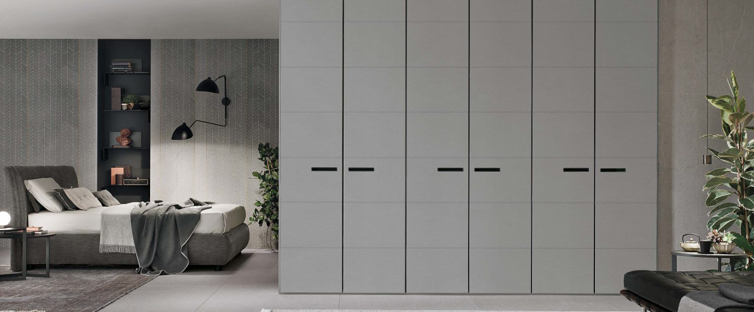 “Dress wardrobe by Tomasella – modern Italian wardrobe with smooth handleless doors and sleek minimalist design”