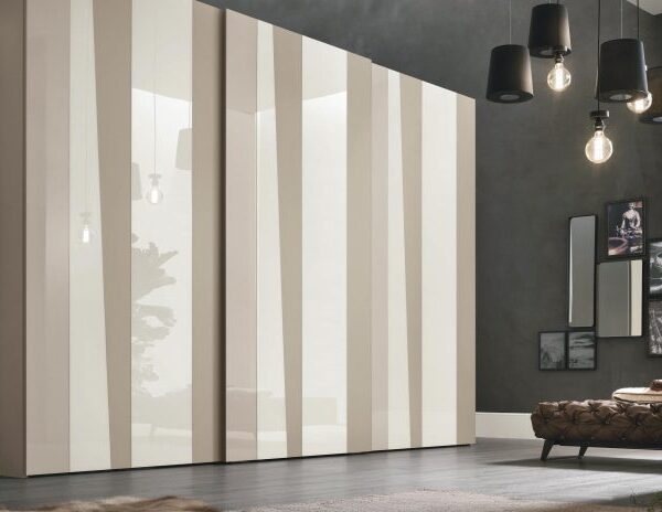 “Kelly Sliding wardrobe by Tomasella – modern Italian wardrobe with sleek sliding doors, geometric panel design, and minimalist styling”