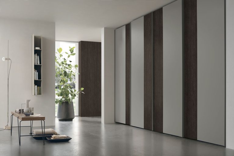 "Tomasella Strip Sliding – contemporary wardrobe featuring layered panel design, clean lines, and soft-close sliding system"