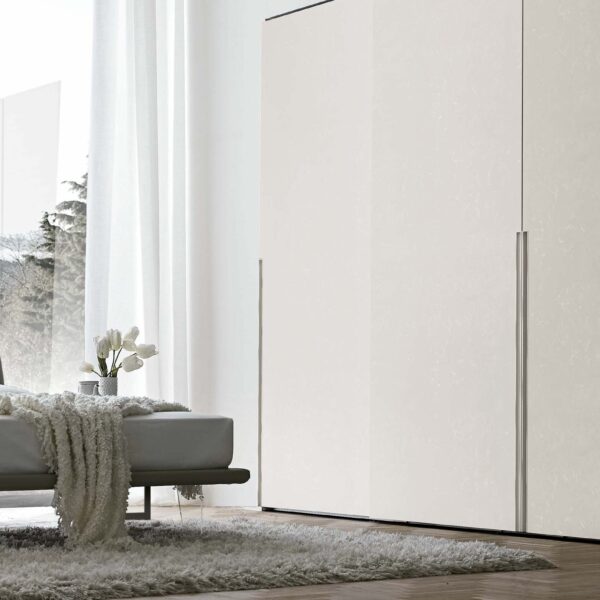 “Doris Sliding wardrobe by Tomasella – modern Italian wardrobe with smooth sliding doors and integrated recessed handles”