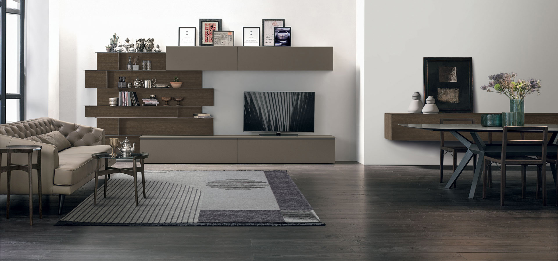 “Atlante UNIT_AT113 by Tomasella – modern Italian wall unit with low-profile TV base and vertical open shelving elements”