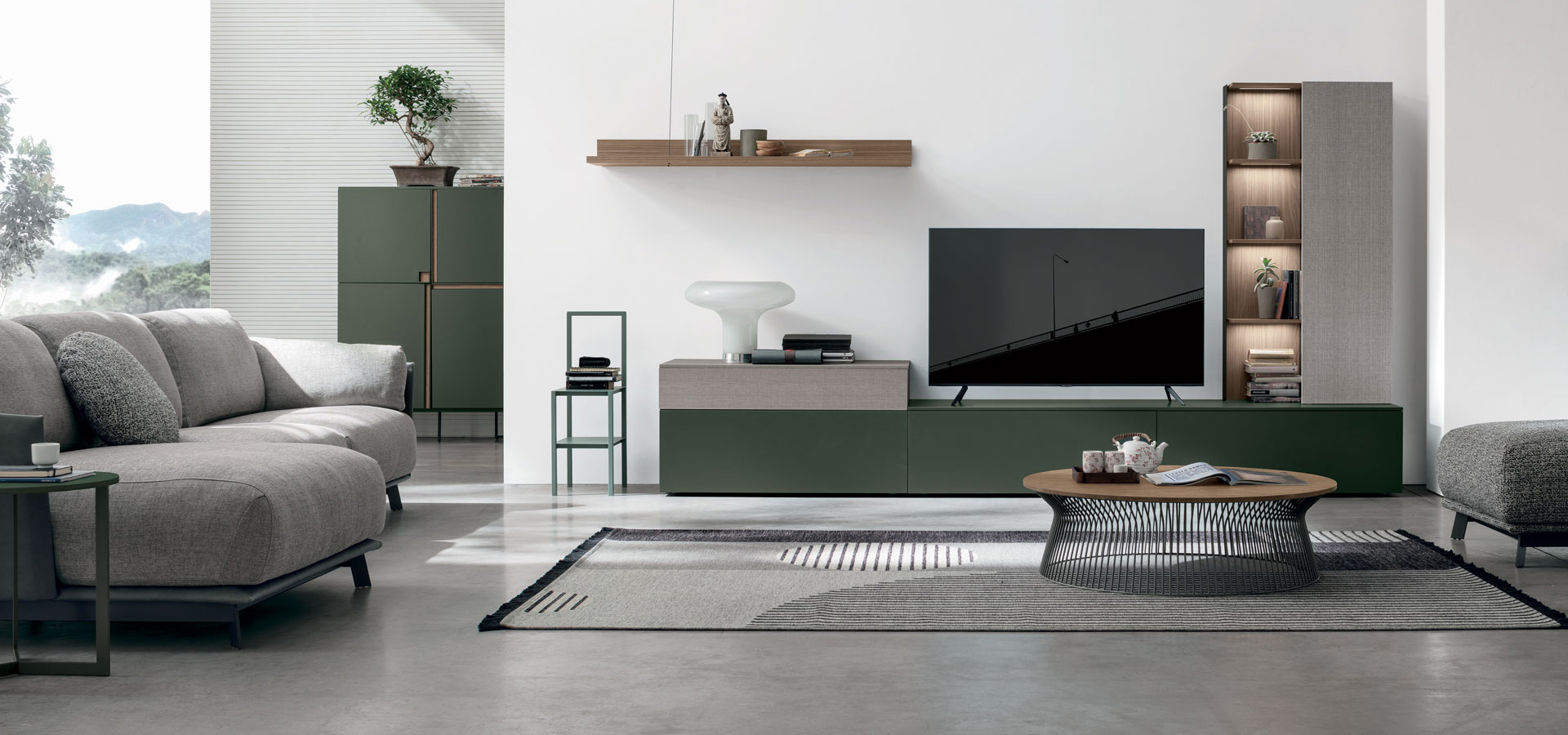 “Atlante UNIT_AT116 by Tomasella – modern Italian wall unit with asymmetrical open shelving and suspended base cabinet”