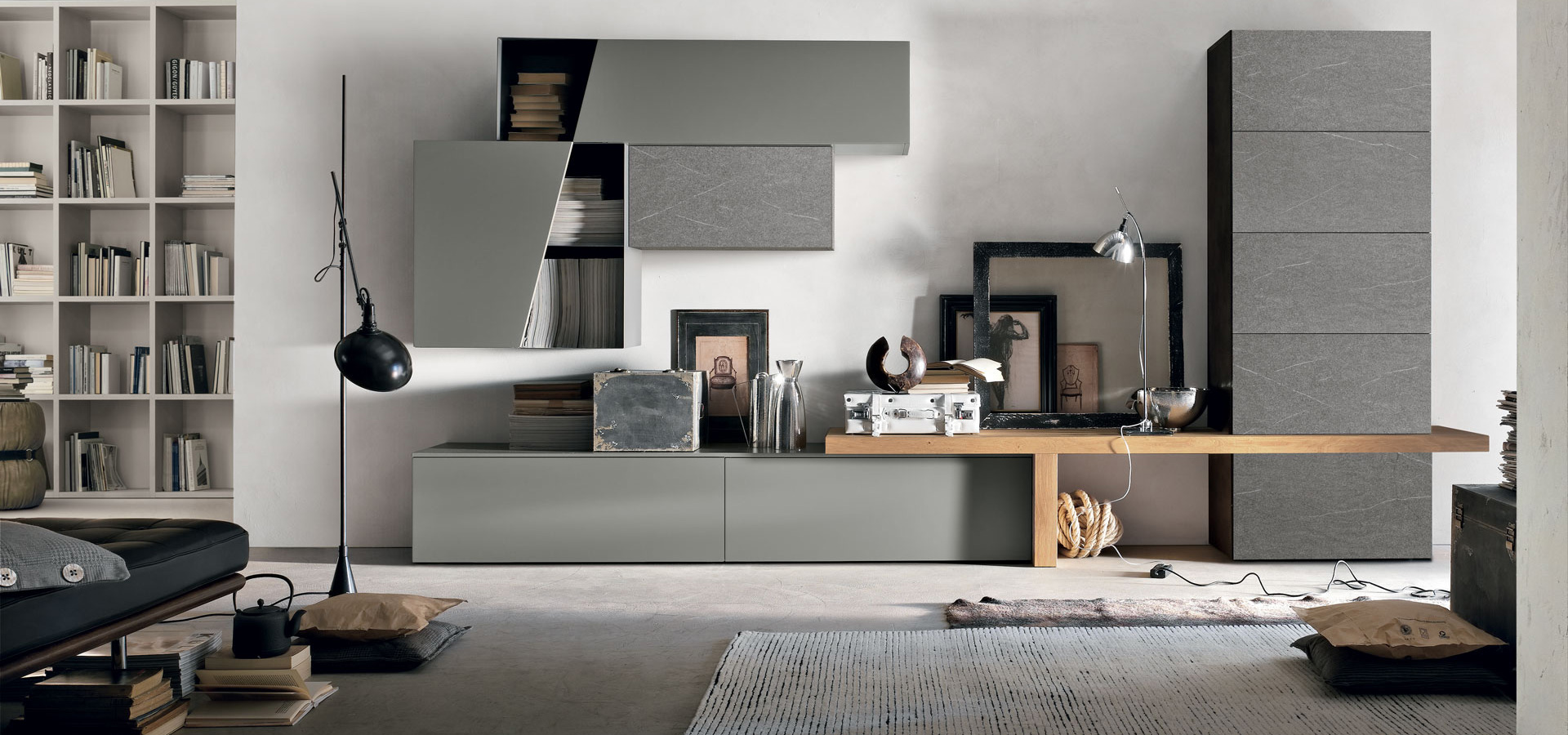 “Atlante UNIT_AT128 by Tomasella – modern Italian wall unit with low-profile TV base, open shelving, and minimalist design”