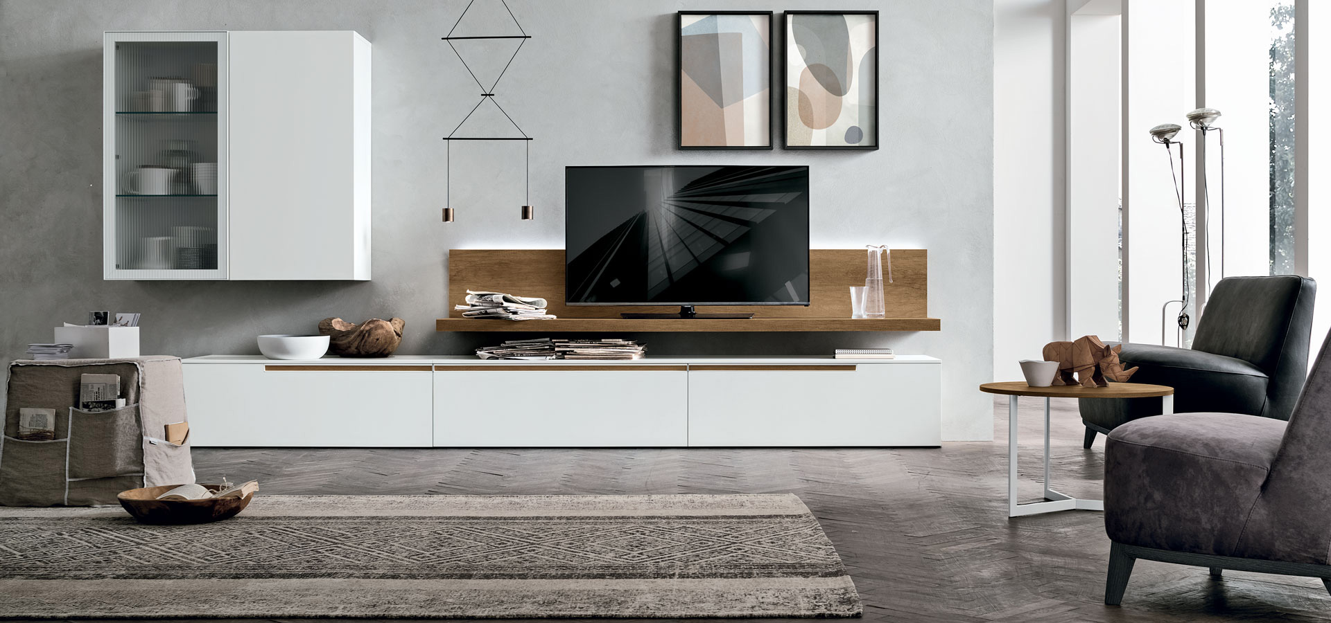 “Atlante UNIT_AT130 by Tomasella – modern Italian wall unit with floating TV base and geometric open shelving design”