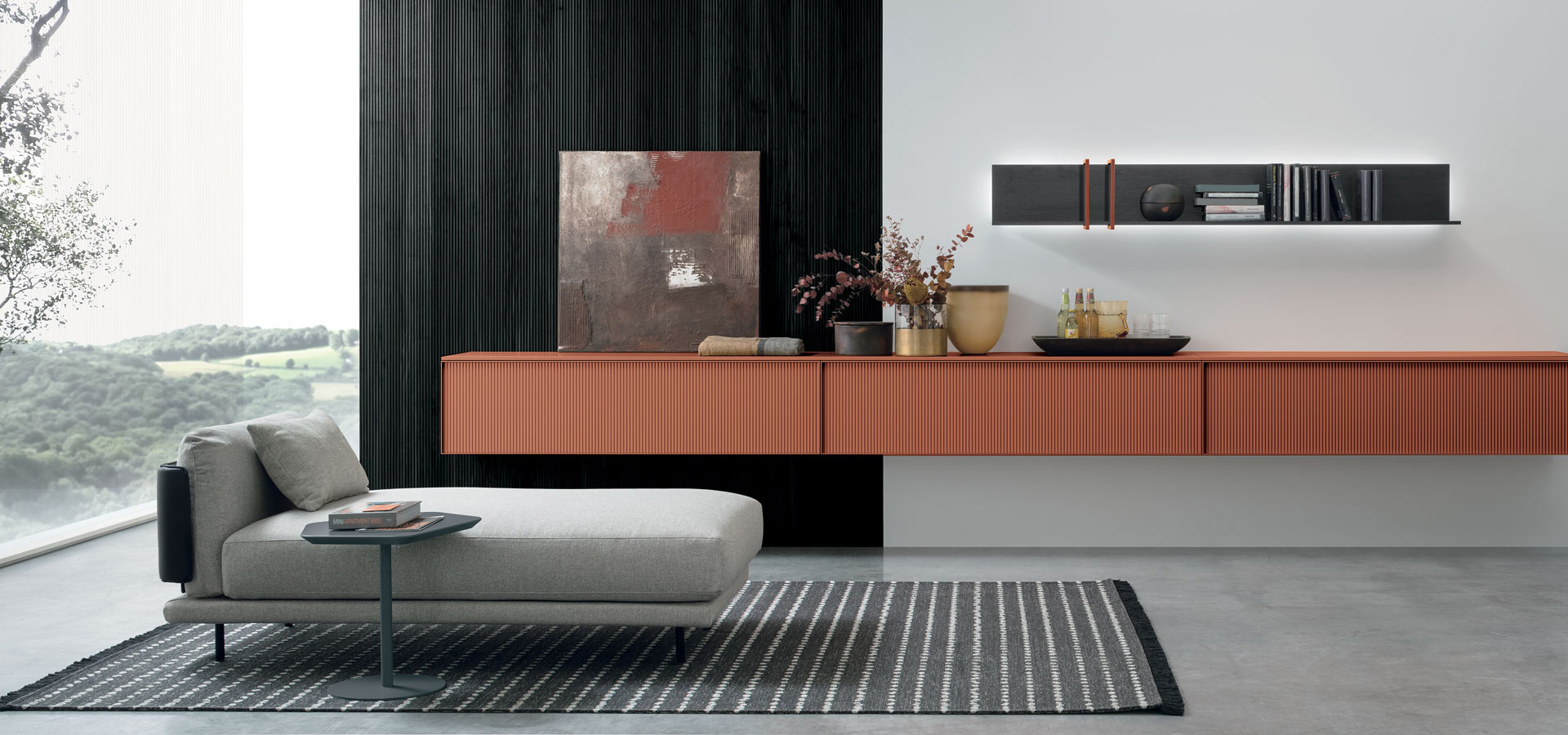 “Atlante UNIT_AT135 by Tomasella – modern Italian wall unit with floating TV base, vertical display shelving, and minimalist modular design”
