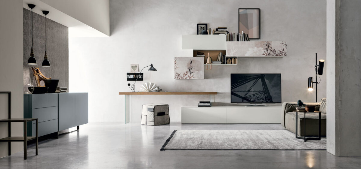 “Atlante UNIT_AT138 by Tomasella – modern Italian wall unit with suspended TV base and tall open shelving in sleek matte finish”