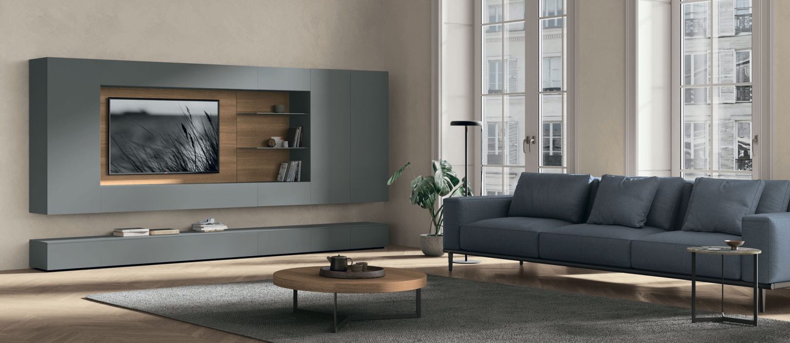 “Atlante UNIT_AT143 by Tomasella – modern Italian wall unit with suspended TV base, vertical shelving, and closed storage in matte finish”
