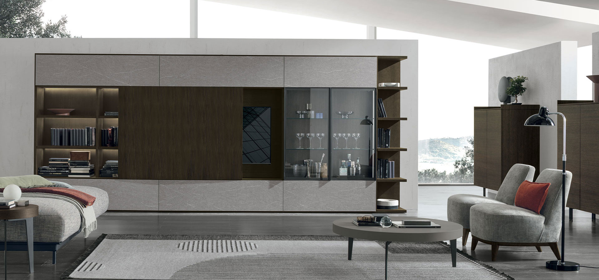 “Atlante UNIT_AT211 by Tomasella – modern Italian wall unit with asymmetrical shelving, closed cabinets, and minimalist design”