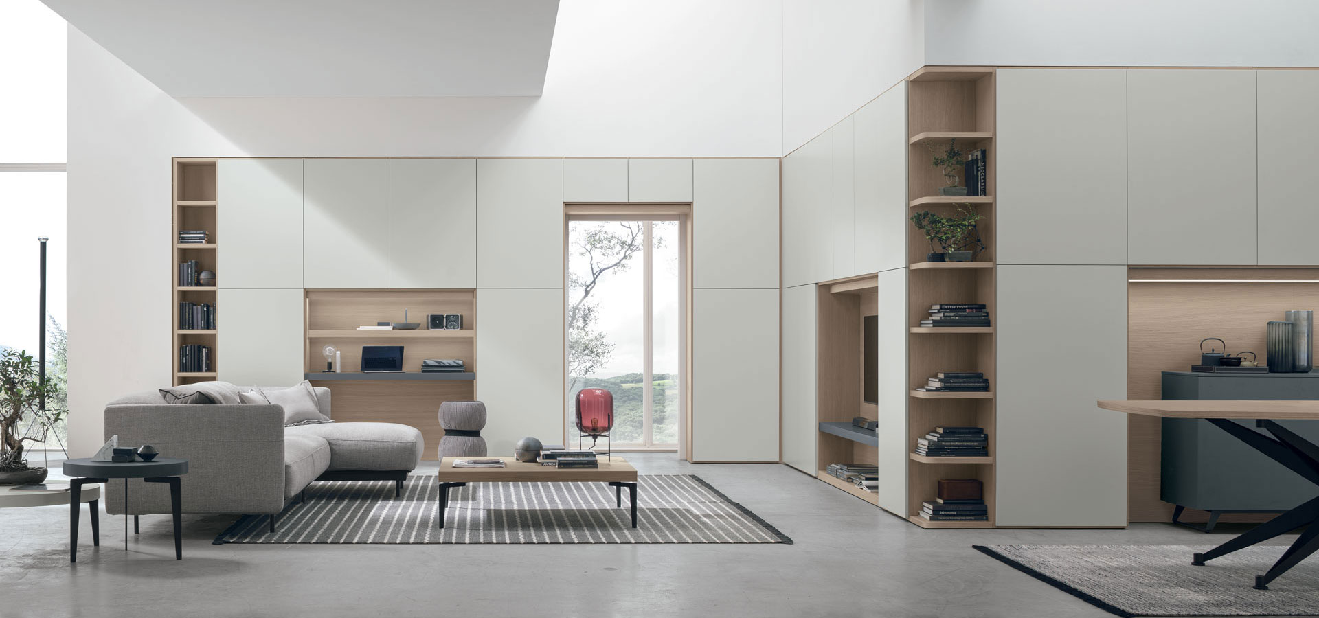 “Atlante UNIT_AT217 by Tomasella – modern Italian wall unit with a balanced combination of open shelves and closed cabinetry in a minimalist layout”