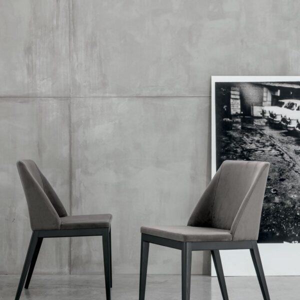 “Atlas chair by Tomasella – modern Italian armchair with elegant curved backrest and contemporary upholstered design”