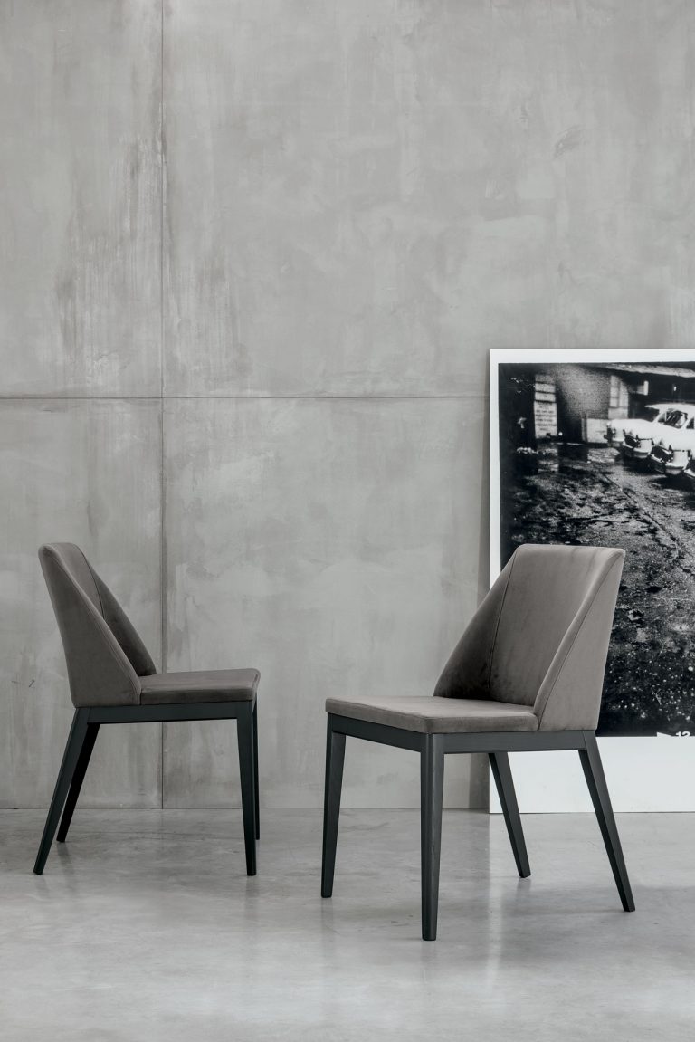 “Atlas chair by Tomasella – modern Italian armchair with elegant curved backrest and contemporary upholstered design”