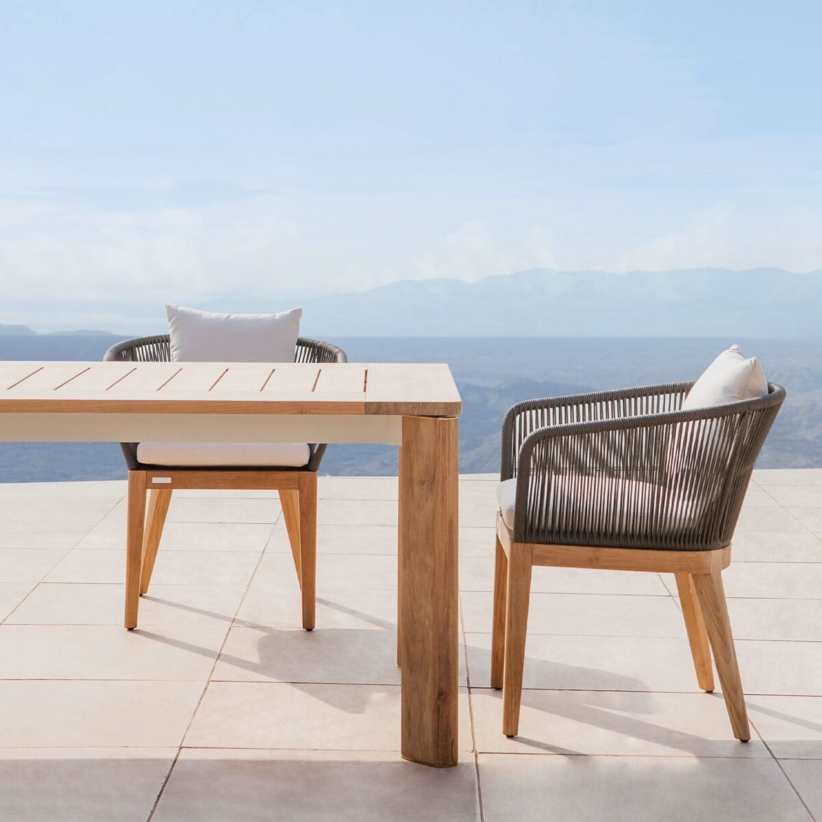 “Avalon Dining Chair by Harbour – modern outdoor chair with woven backrest and cushioned seat”
