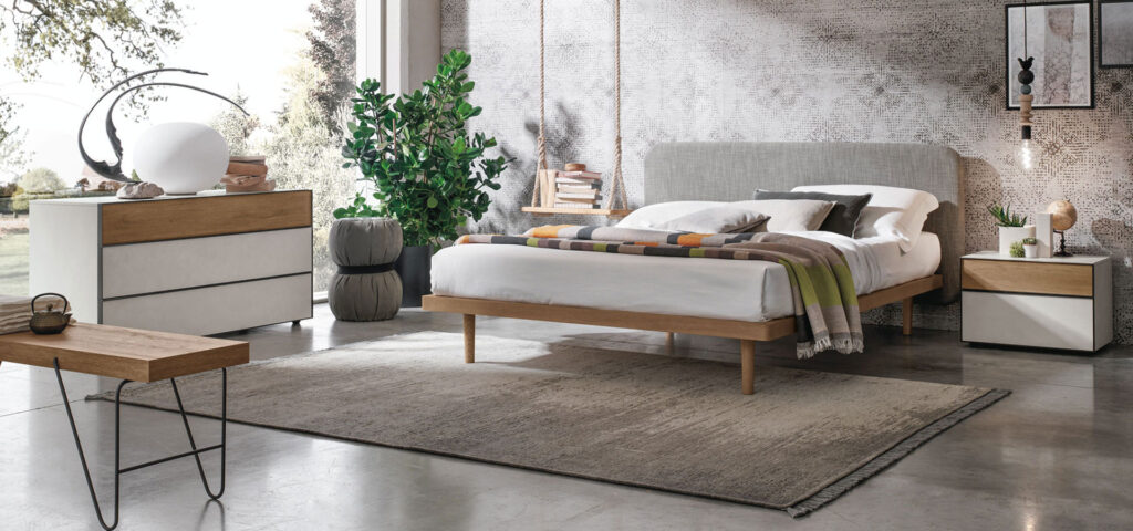 “Milly bed by Tomasella – modern Italian bed with curved upholstered headboard and slim minimalist frame”