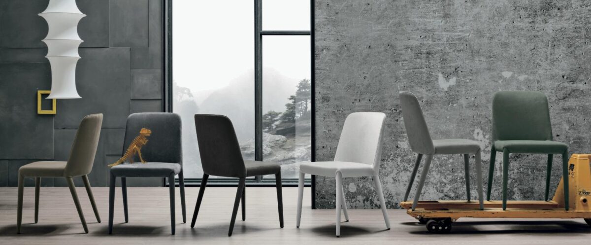 “Betty chair by Tomasella – modern Italian dining chair with curved upholstered back and sleek metal legs”