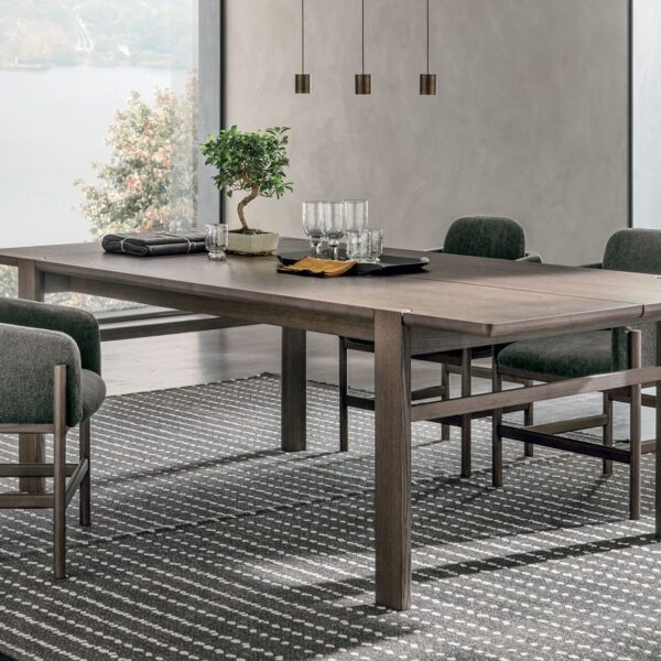 “Bite table by Tomasella – modern Italian dining table with unique angular legs and contemporary minimalist design”