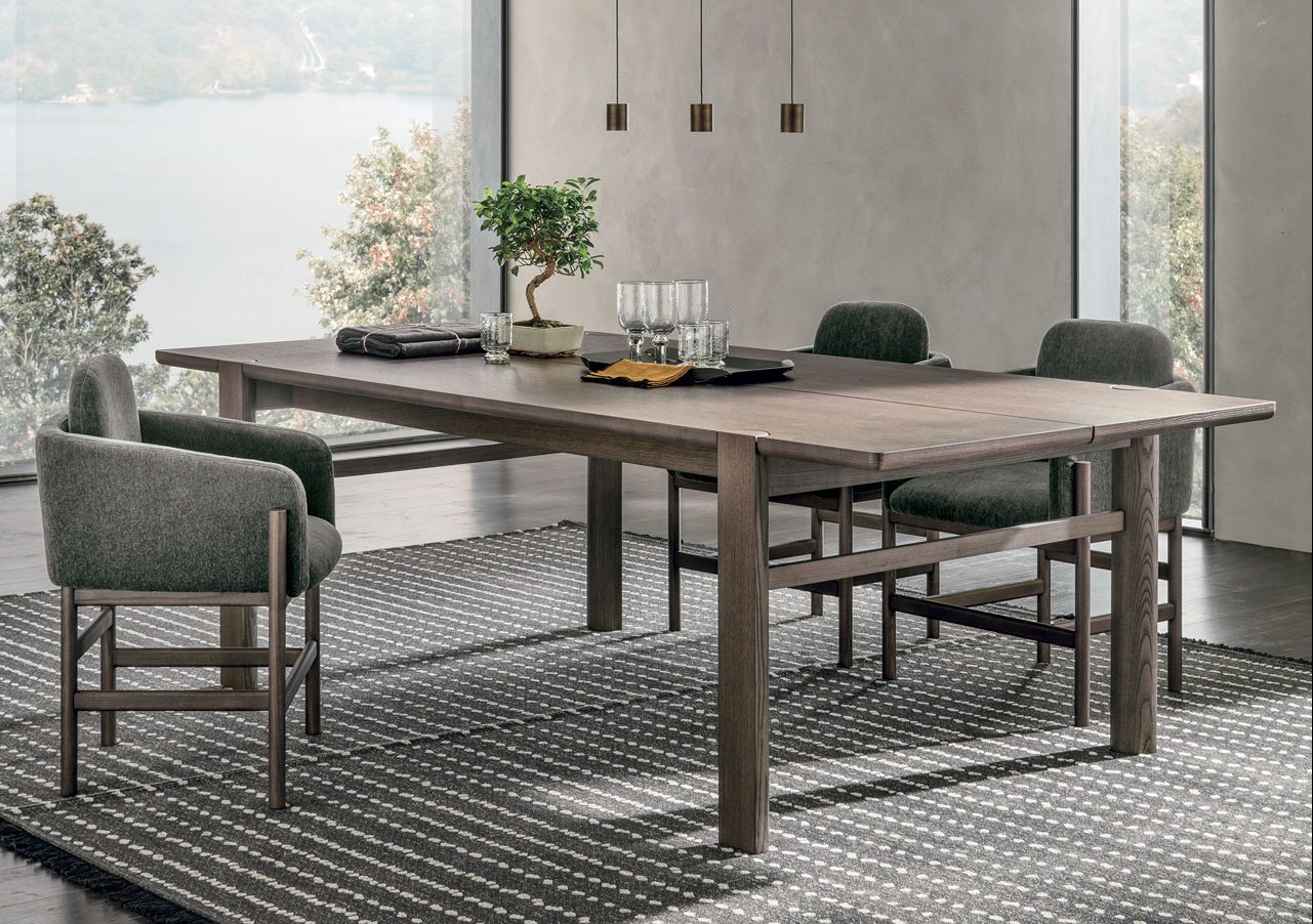 “Bite table by Tomasella – modern Italian dining table with unique angular legs and contemporary minimalist design”