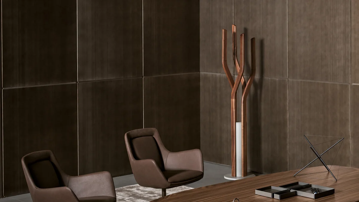 Bonaldo Alma coat stand, a totemic piece with dynamic spiral branch layout on solid concrete foundation