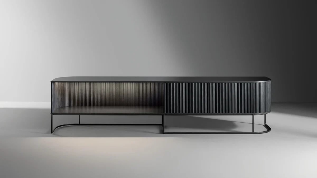 Bonaldo Dune TV unit with integrated LED lighting, creating a striking backlit effect under the top shelf.