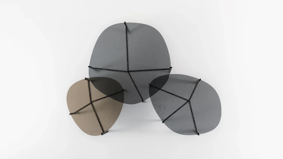 Modern layered Flac coffee tables collection by Bonaldo, three heights and three diameters with mixed materials and minimal metal base