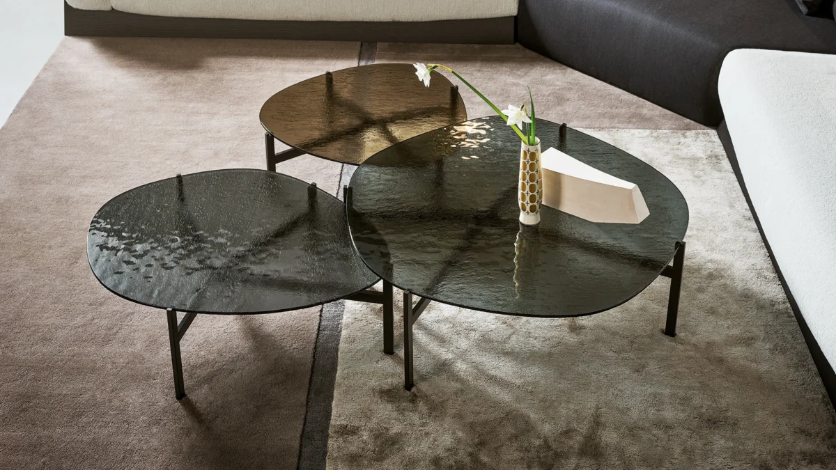 Bonaldo Flac set of three coffee tables combining smoked glass, wood and ceramic tops with minimal metal bases for layered styling