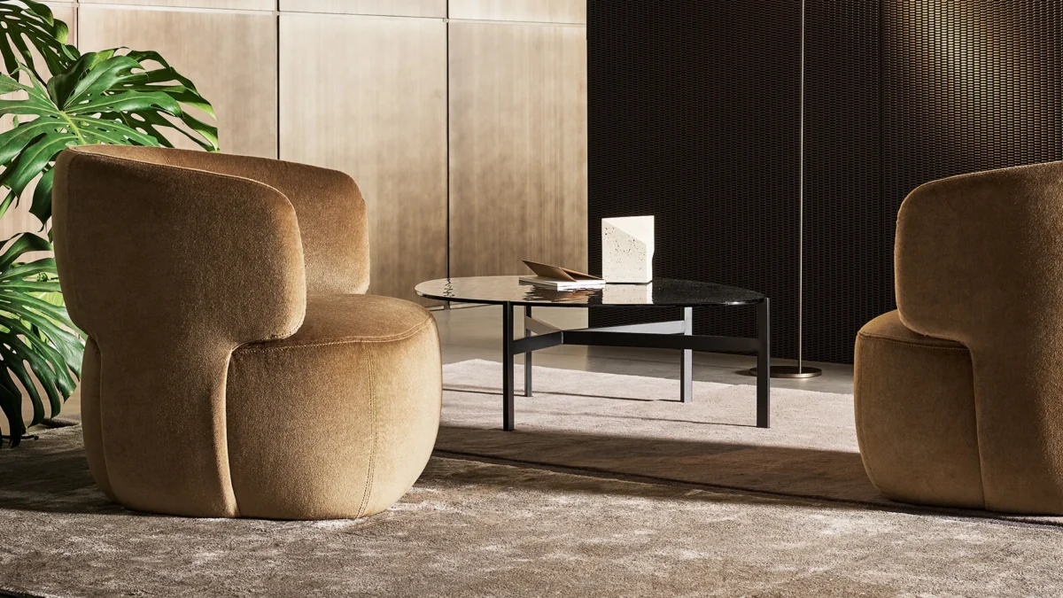 Flac low glass coffee table by Bonaldo with bronzed glass that appears to float on thin bronze finished legs—modern and elegant