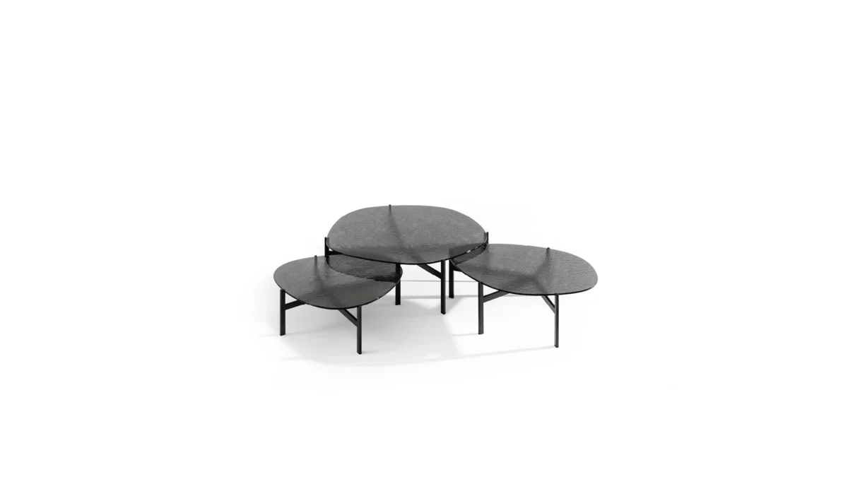 Bonaldo Flac coffee table low in bronzed tempered glass with slender bronze‑finished metal base, evoking a water‑surface ripple effect