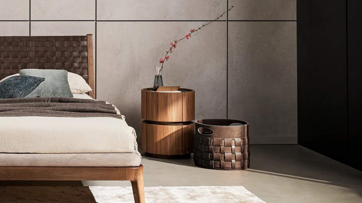 Elegant Roger basket by Bonaldo, crafted from rich dark-brown leather with woven detail and top grips