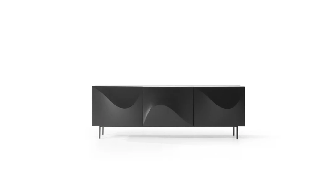 Bonaldo Vertigo sideboard by Pocci & Dondoli, featuring undulating polyurethane doors, lacquered wood frame, and slender metal base.