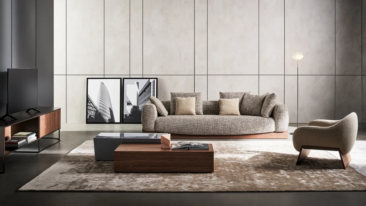 Bonaldo Boolean fixed or swivel armchair with seamless upholstery and wood‑crossing base detail