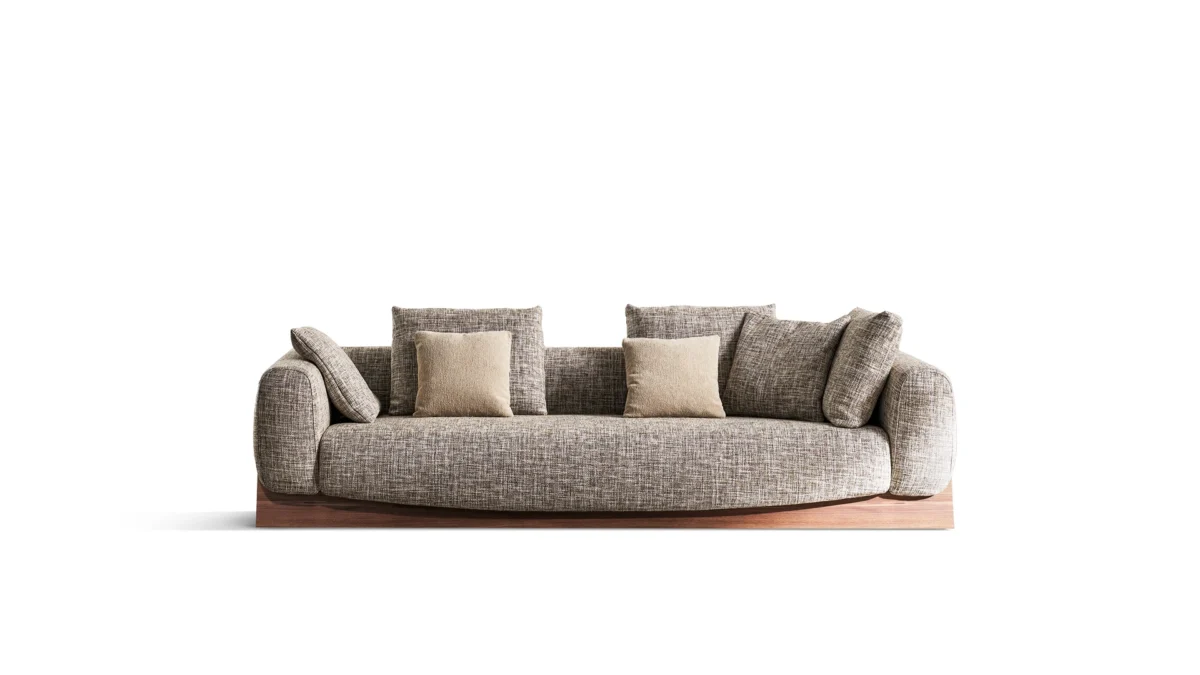 Bonaldo Boolean armchair with enveloping curved shell and solid walnut bridge‑style base