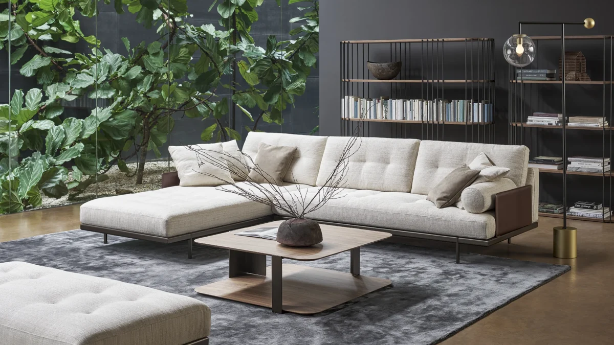 Maximilian sectional sofa by Bonaldo with chaise lounge and integrated end table.