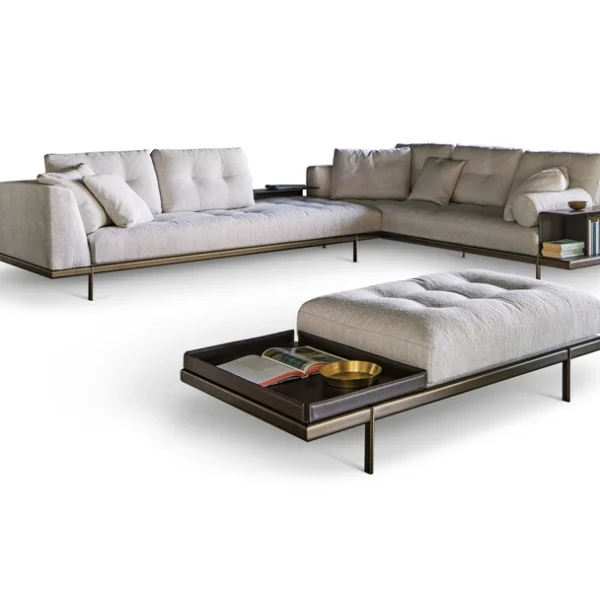 Maximilian modular sofa by Bonaldo with tufted upholstery, metal base, and optional leather accessories.