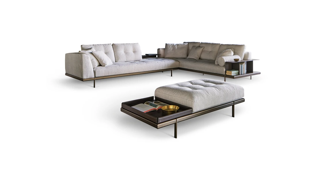 Maximilian modular sofa by Bonaldo with tufted upholstery, metal base, and optional leather accessories.