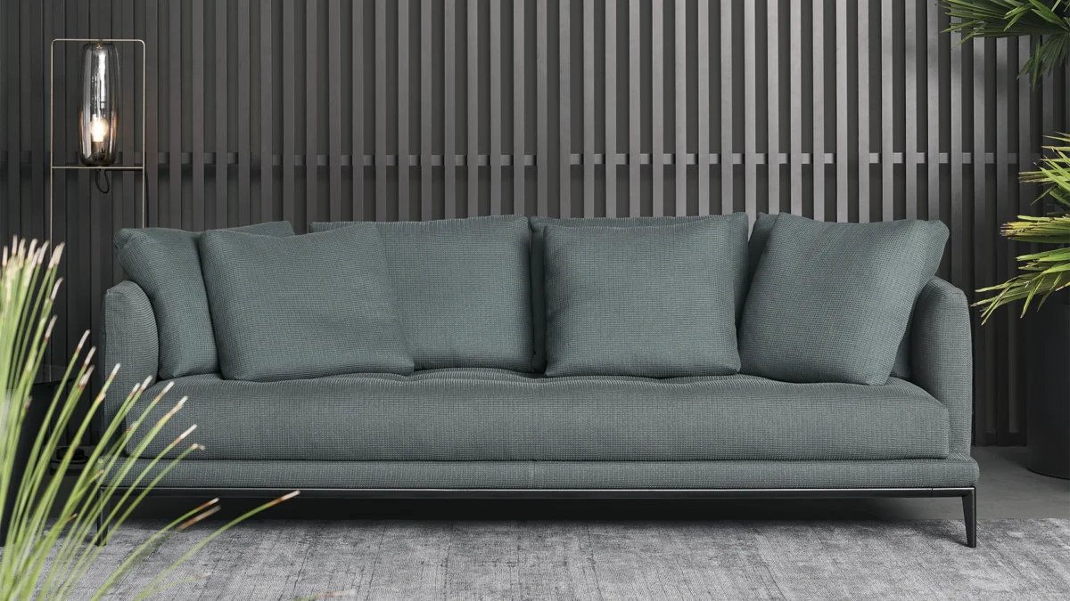 Soft Island sofa by Bonaldo, with tufted detailing on the seats, providing a sense of movement and elegance.