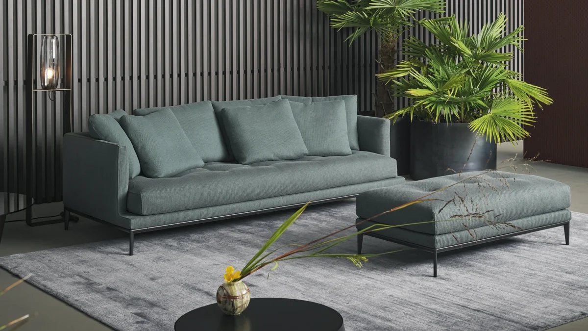 Minimalist Soft Island sofa featuring a wide body and clean lines, accommodating a single long seat cushion.