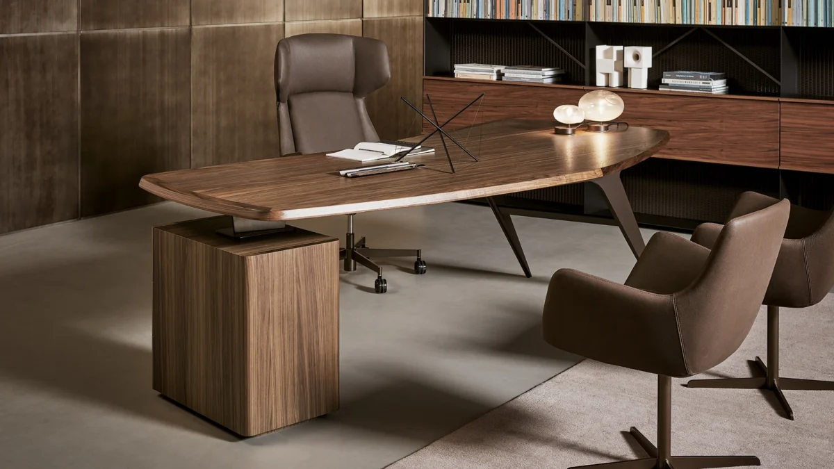 Elegant Flatiron executive workspace desk by Bonaldo combining smooth walnut surface and angular contrasting metal legs