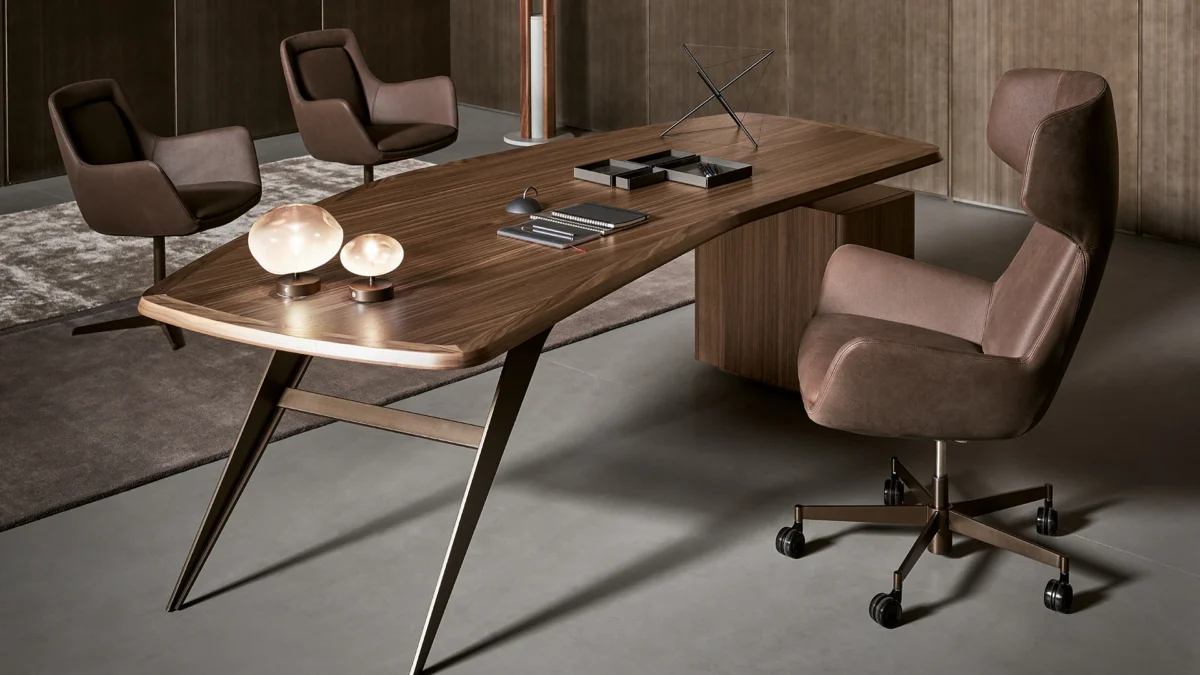 Bonaldo Newton Low swivel chair in lead metal finish, upholstered in a combination of Capri leather and Must fabric, ideal for contemporary office spaces.