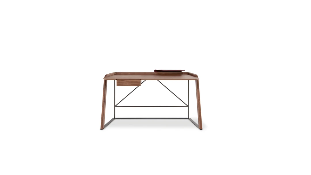 "Back view of Gauss chair showing smooth curves and tapered metal legs."