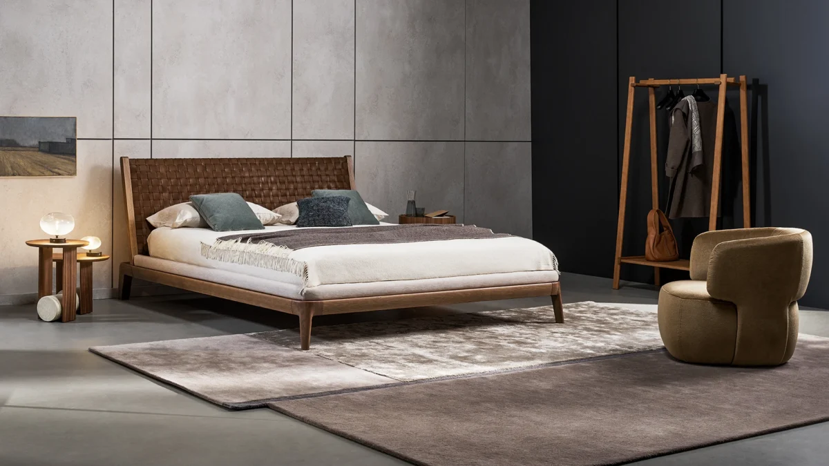 Honeymoon double bed by Bonaldo with padded perimeter edge graduating from wood to fabric mattress frame