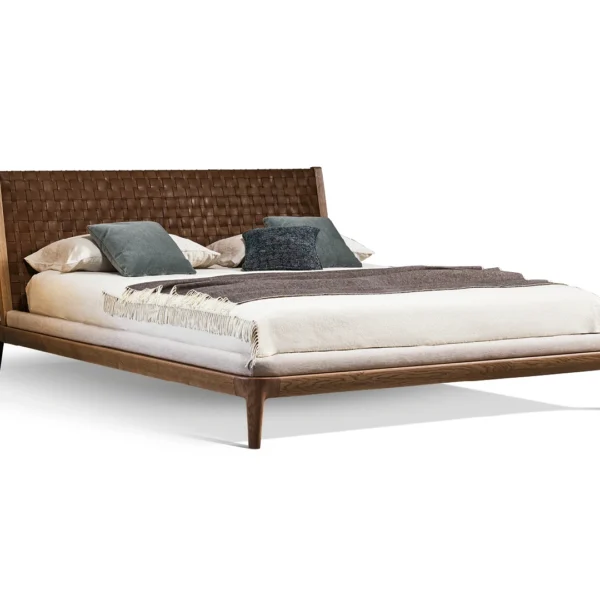 Bonaldo Honeymoon bed with solid American walnut frame and woven full‑grain leather headboard