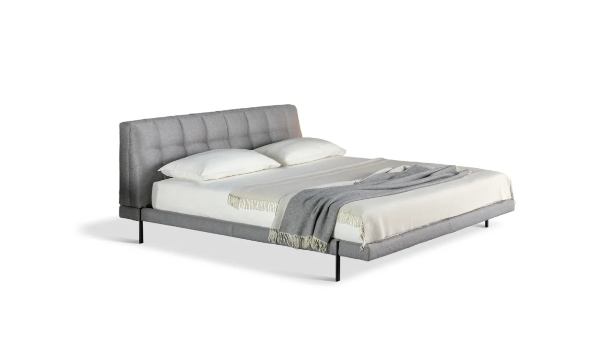 Bonaldo James Bench by Sergio Bicego, featuring 1950s-inspired quilted upholstery and minimalist cylindrical metal legs.