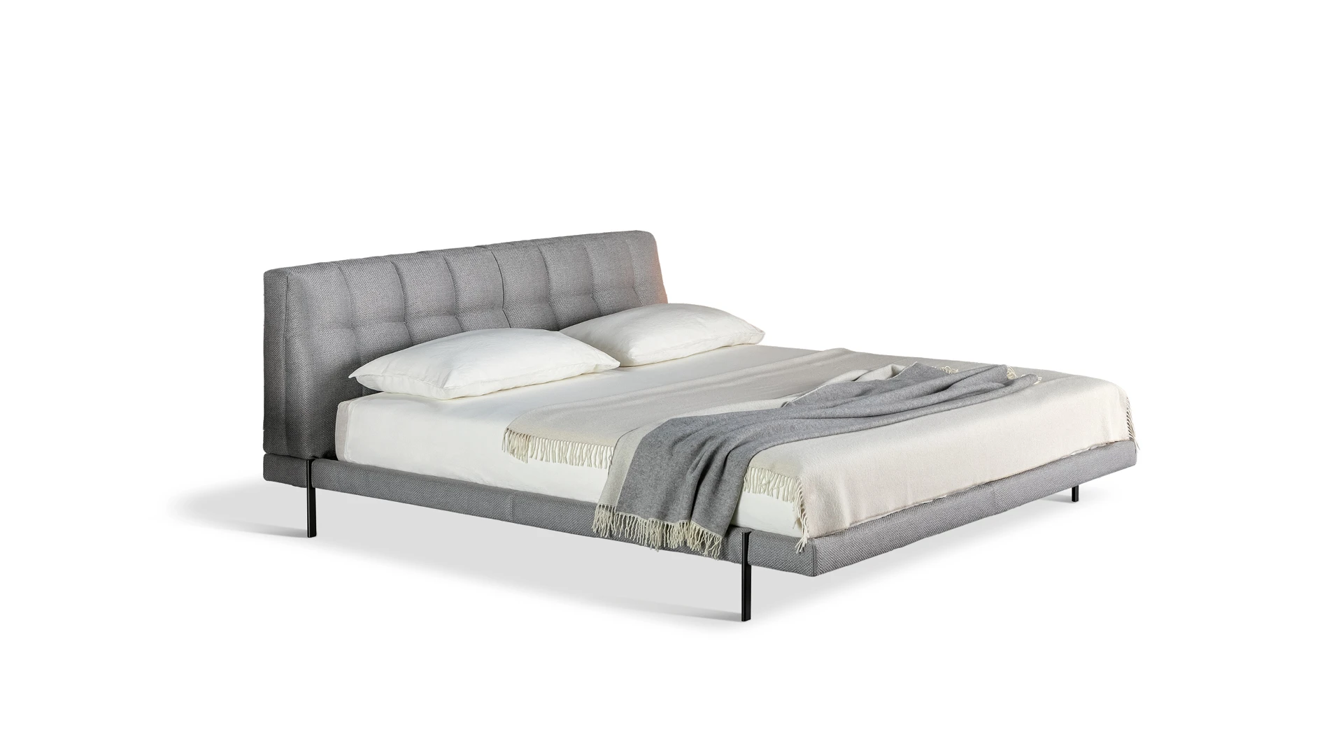 Bonaldo James Bench by Sergio Bicego, featuring 1950s-inspired quilted upholstery and minimalist cylindrical metal legs.