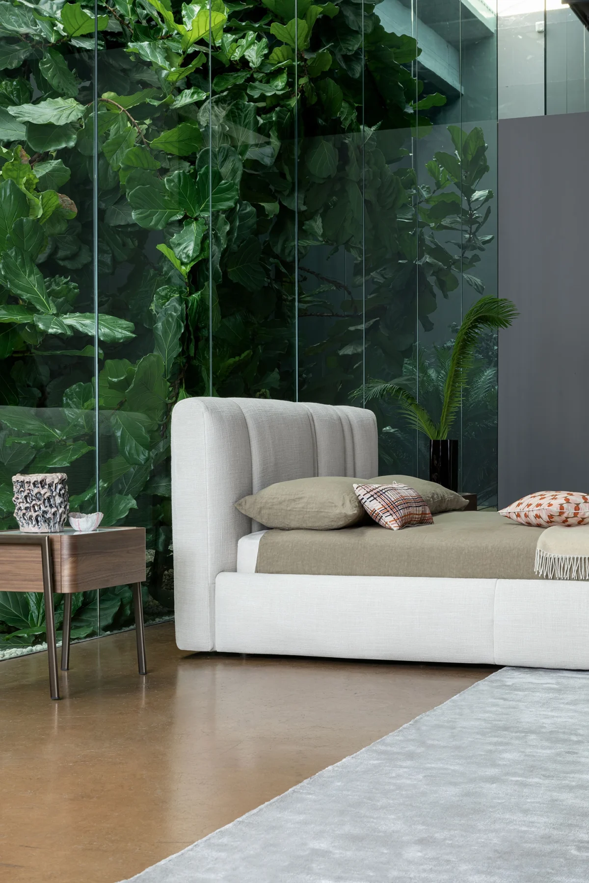 Luxury Rigoletto bed by Bonaldo with distinctive vertical headboard and removable fabric covers.