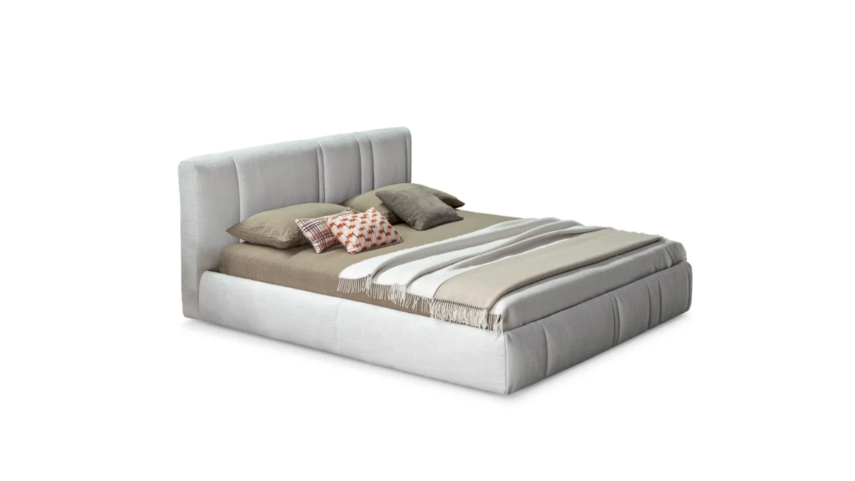 Bonaldo Rigoletto upholstered bed by Paolo Grasselli with geometric headboard and removable fabric covers.
