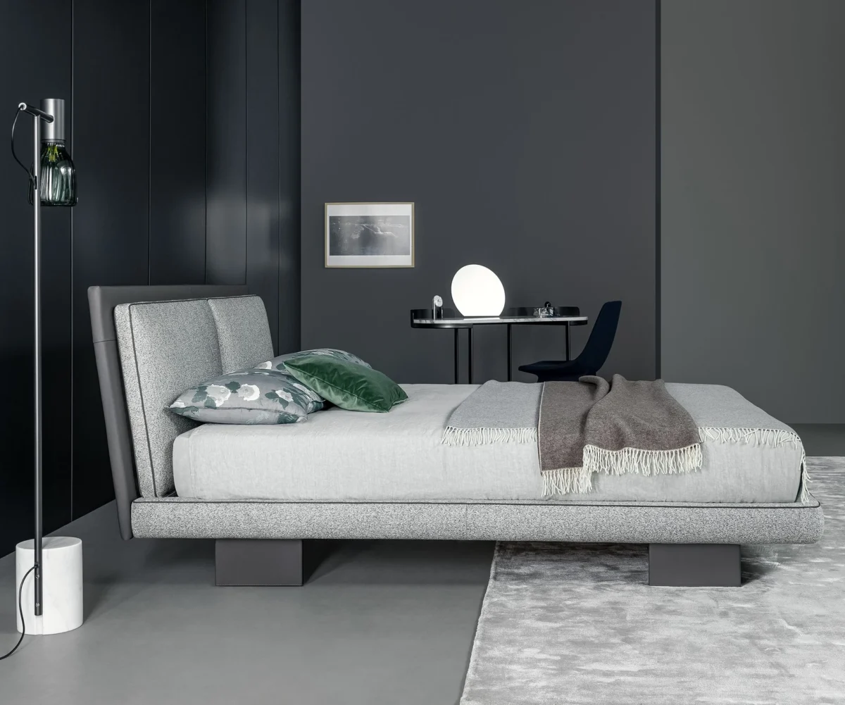 Bonaldo Tara bed in King size with two soft fabric cushions headboard and leather edge trim on cushions and feet