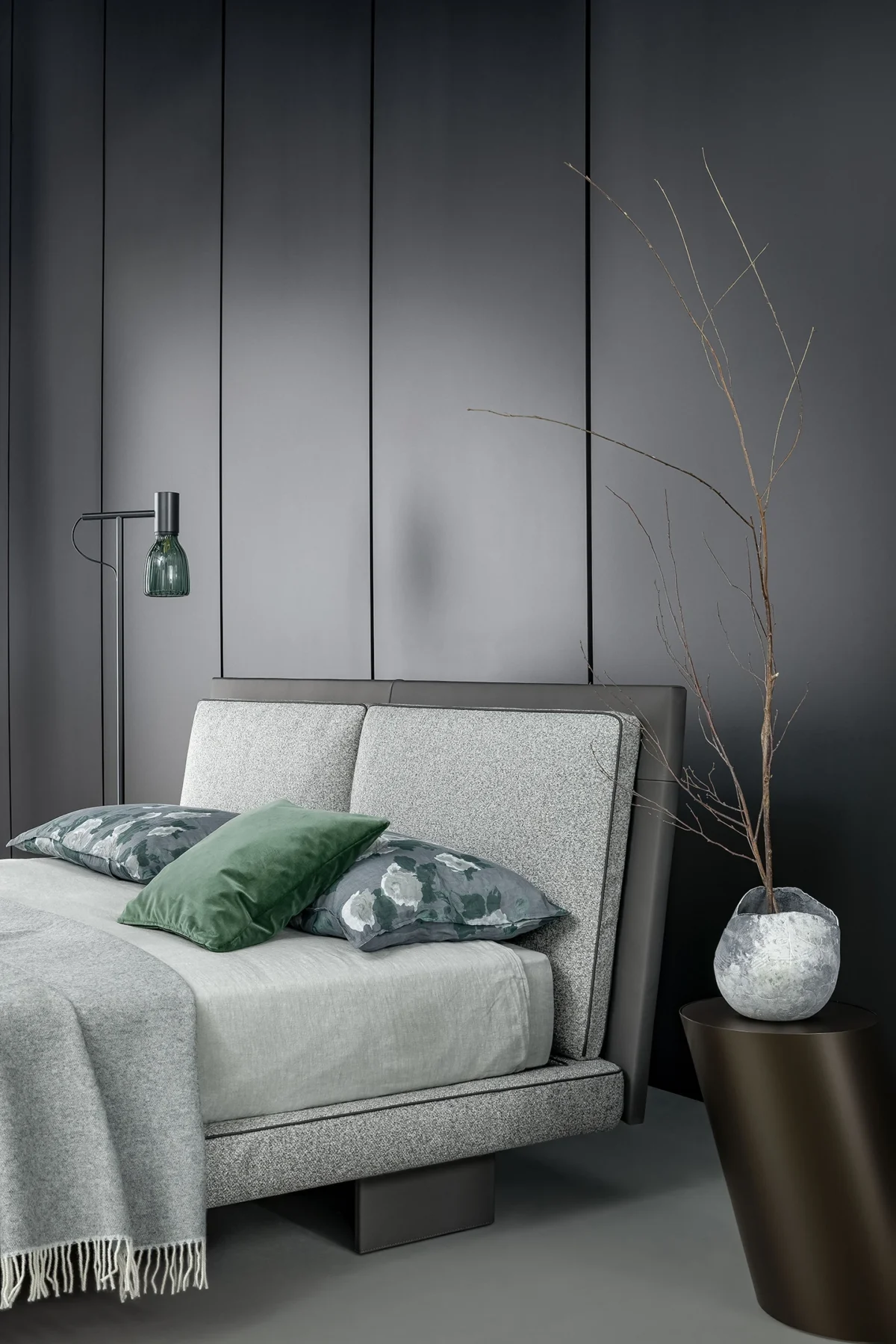 Contemporary Tara bed by Bonaldo featuring elegant piping, dual headboard cushions and slender leather-covered legs
